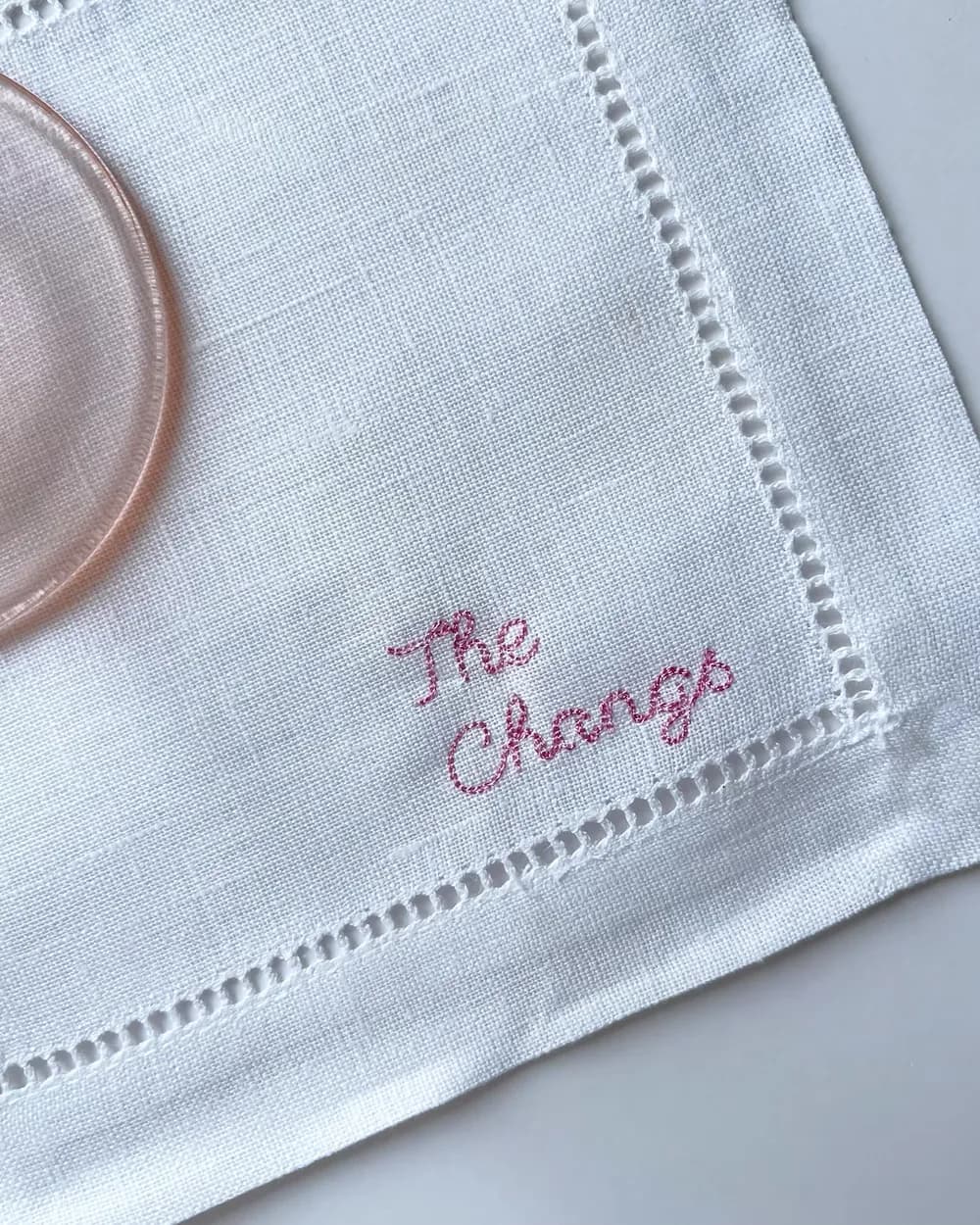 Custom family-name cocktail napkins embroidered for The Changs