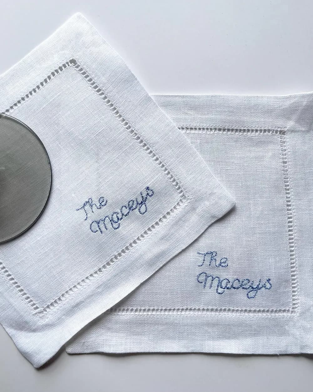 Custom family-name cocktail napkins embroidered for The Maceys