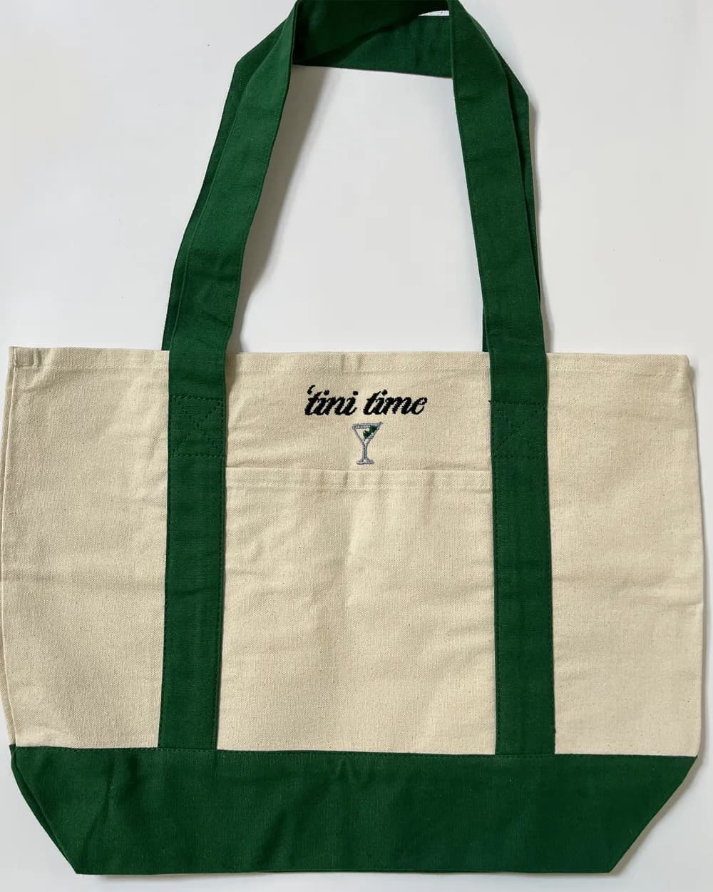Green canvas tote with custom embroidery